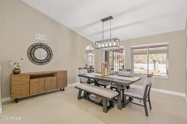 a view of a room with furniture window and wooden floor