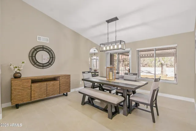 a view of a room with furniture window and wooden floor