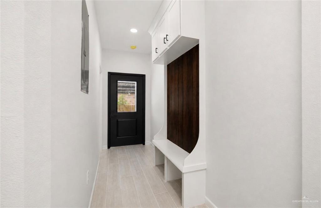352 Elias Lopez Street Rio Grande City, TX 78582 - Photo 15 of 15 a view of a hallway with washer and dryer