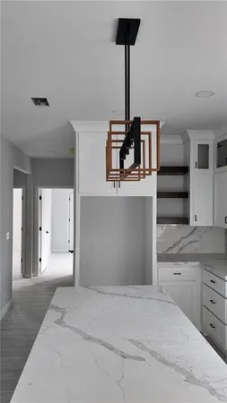 a view of empty room with windows