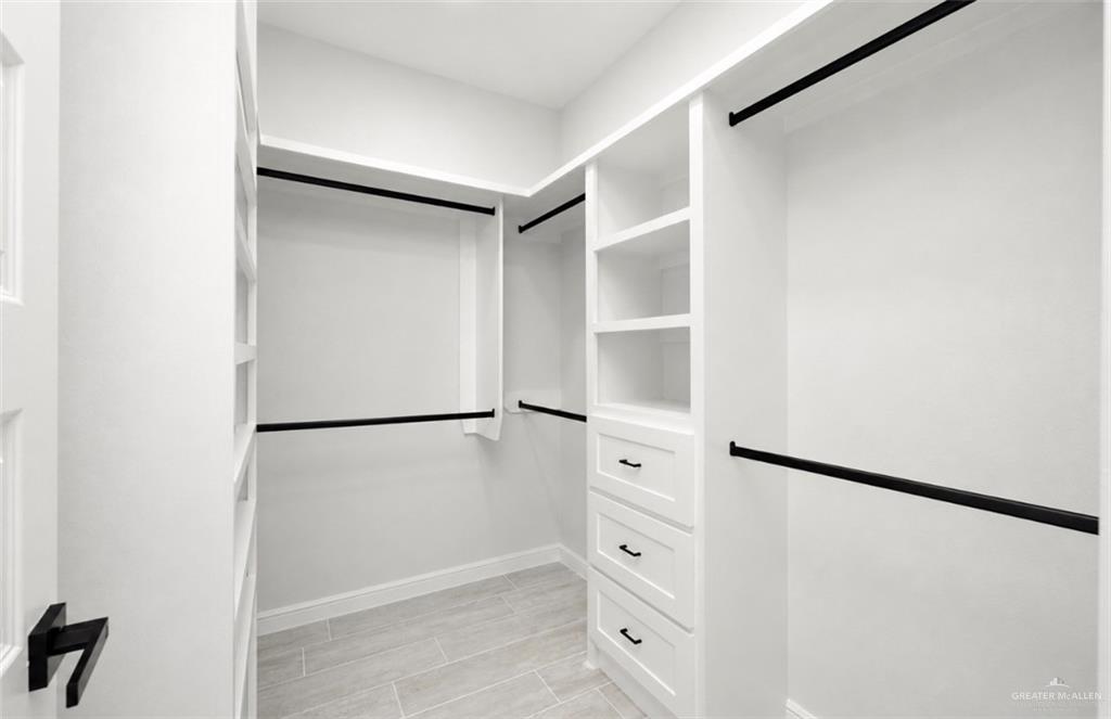 352 Elias Lopez Street Rio Grande City, TX 78582 - Photo 7 of 15 a view of walk in closet with empty racks