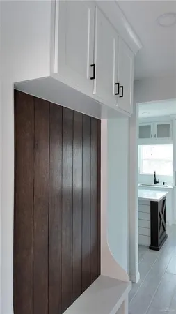 a view of kitchen with furniture and window