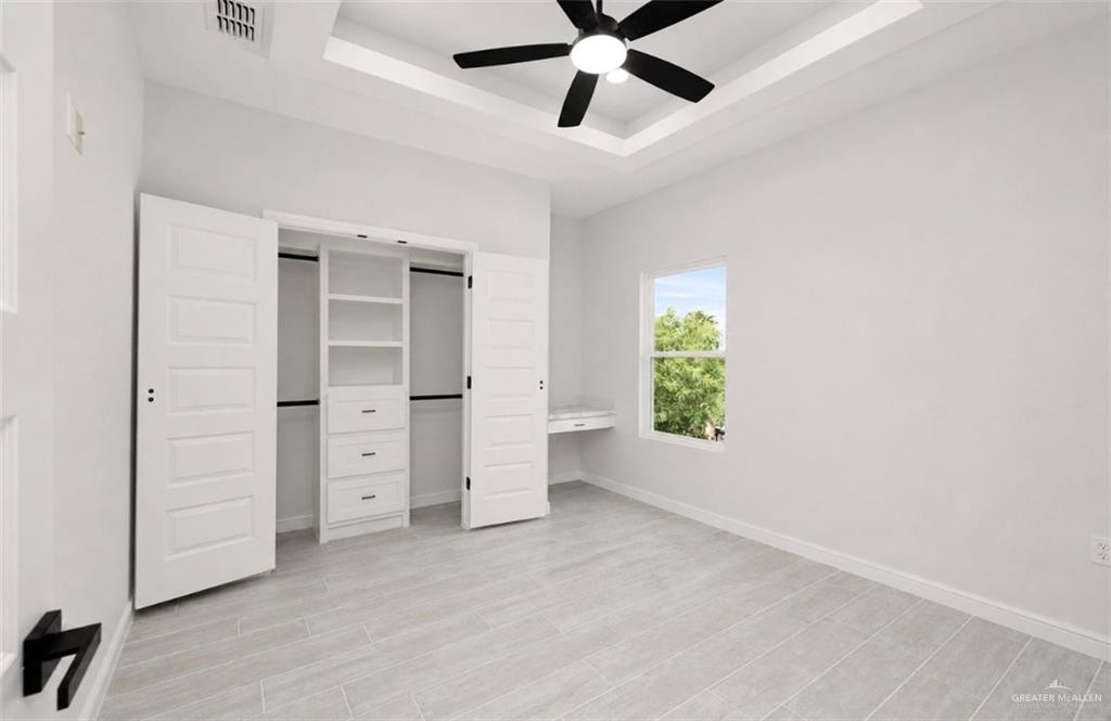 352 Elias Lopez Street Rio Grande City, TX 78582 - Photo 8 of 15 an empty room with closet and windows