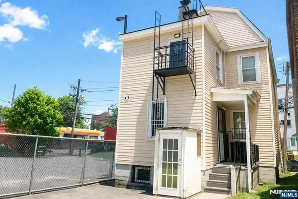 a view of a house with a patio