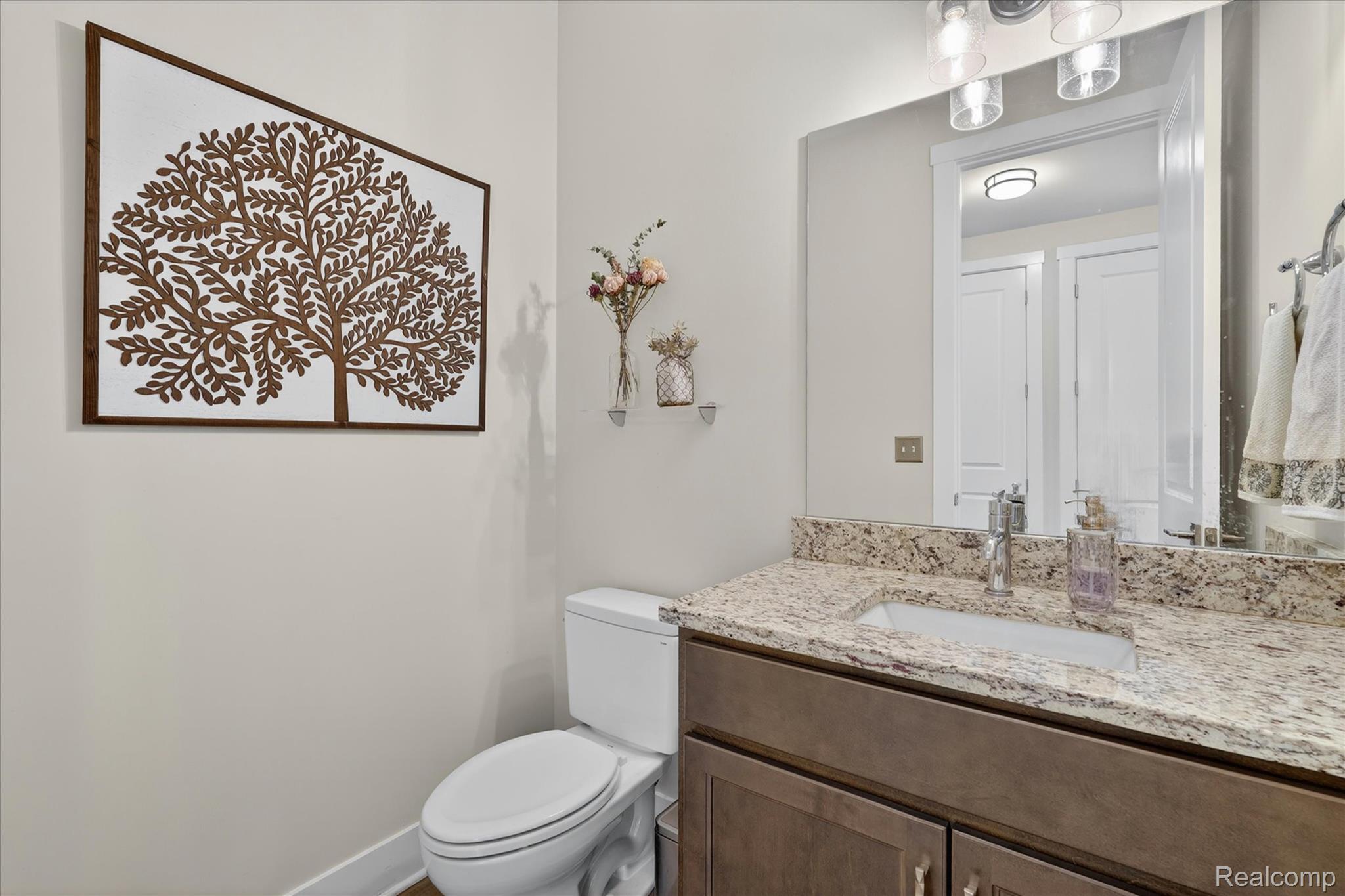 8130 Hinchey Road Pinckney, MI 48169 - Photo 18 of 62 Bathroom featuring vanity and toilet