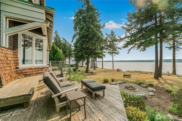 a view of a patio with wooden floor