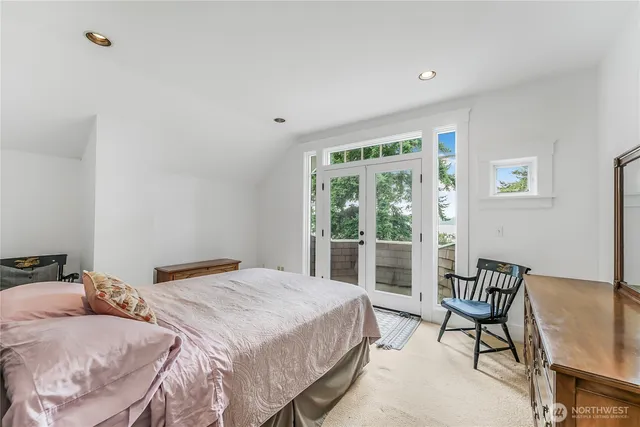 a bathroom with a sink mirror bathtub and toilet