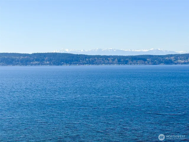 a view of a house with a ocean view