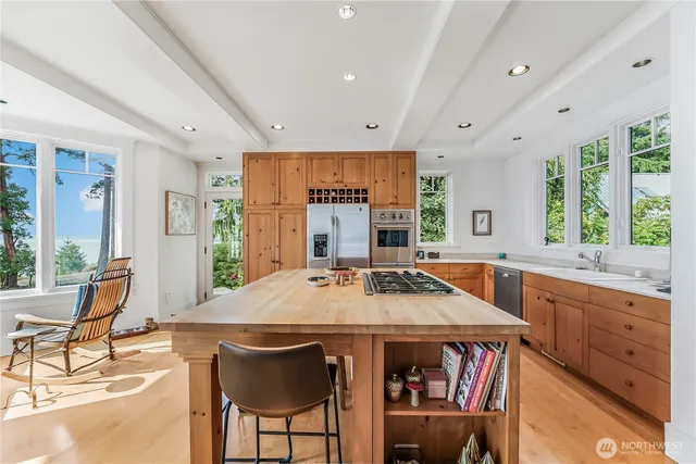 a view of a dining room with furniture window and outside view