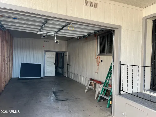 a view of a hallway with stairs
