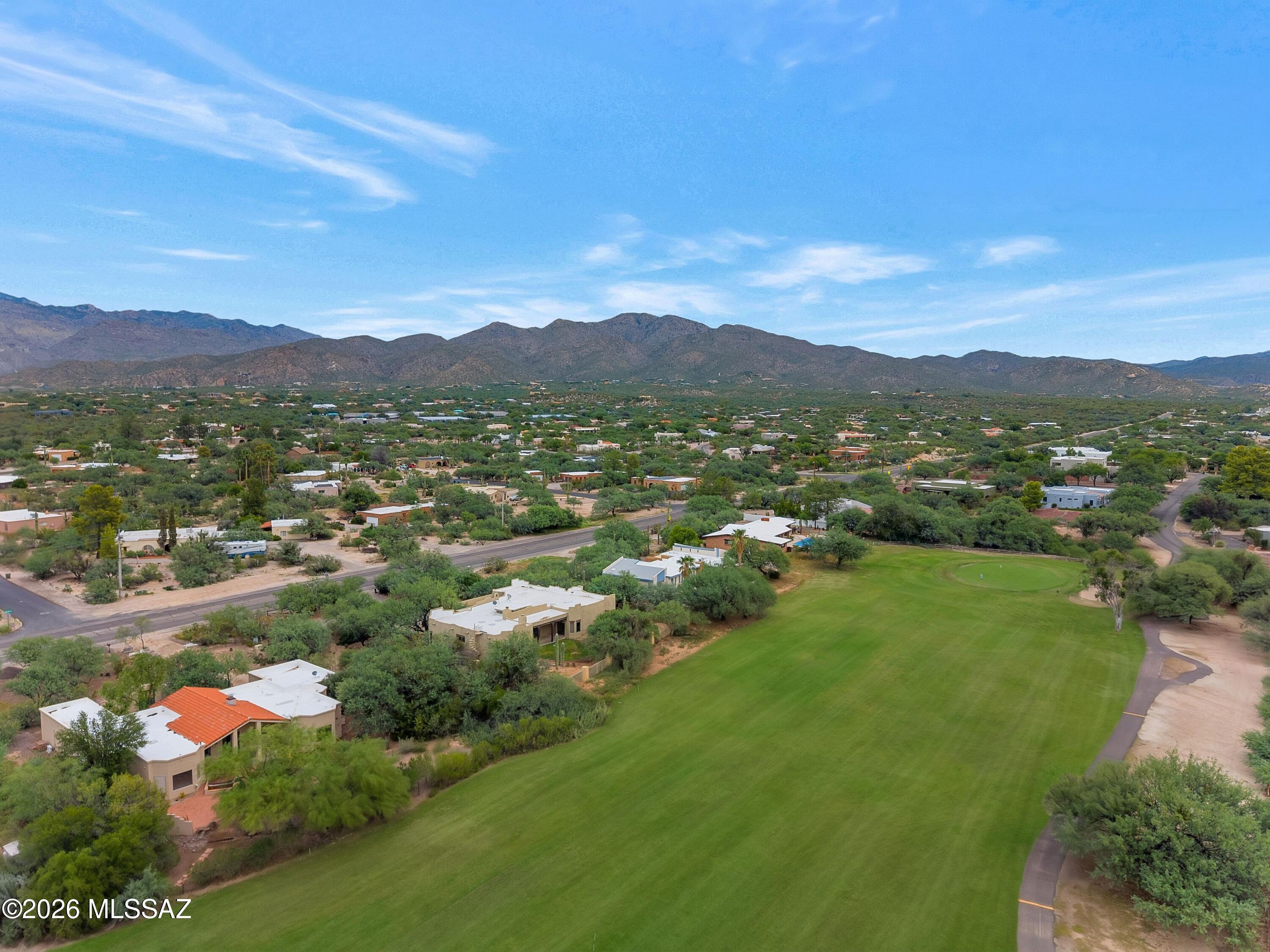 12160 East Tanque Verde Road Tucson, AZ 85749 - Photo 10 of 53 The property is on the first fairway with the Rincon Mountains as backdrop.
