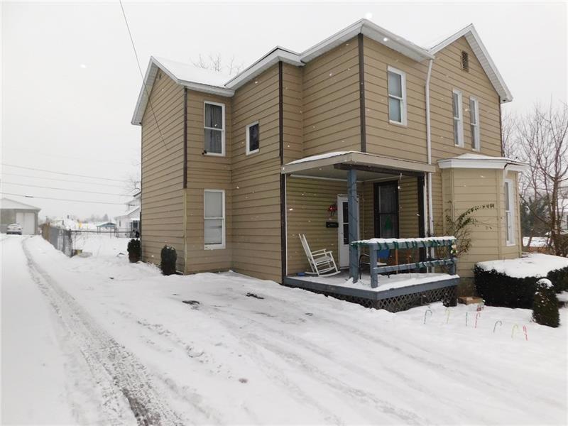 17 Summit Avenue Uniontown, PA 15401 - Photo 2 of 3 a front view of a house with a yard