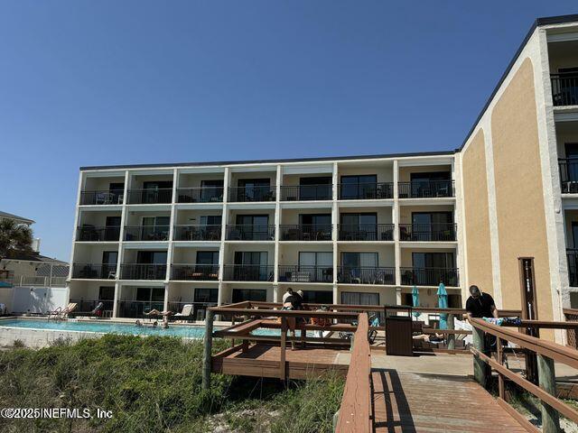6970 A1A South, Unit 234 St. Augustine, FL 32080 - Photo 4 of 11 a view of a house with backyard and sitting area