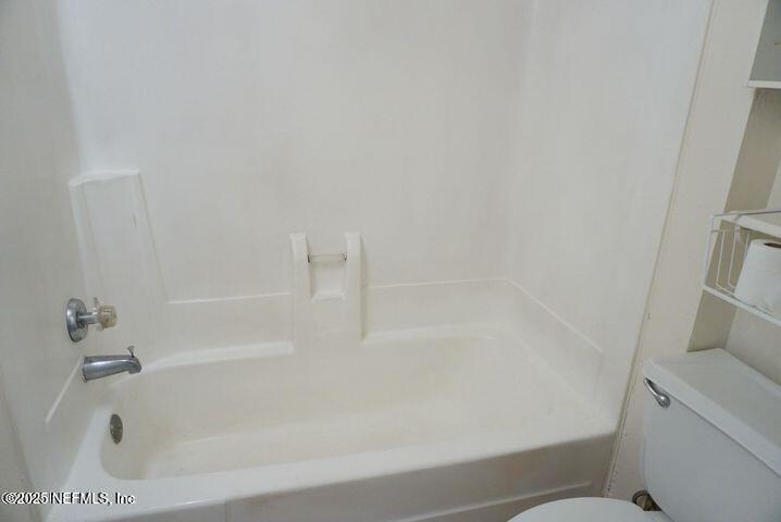6970 A1A South, Unit 234 St. Augustine, FL 32080 - Photo 9 of 11 a close up of a bathtub in a bathroom