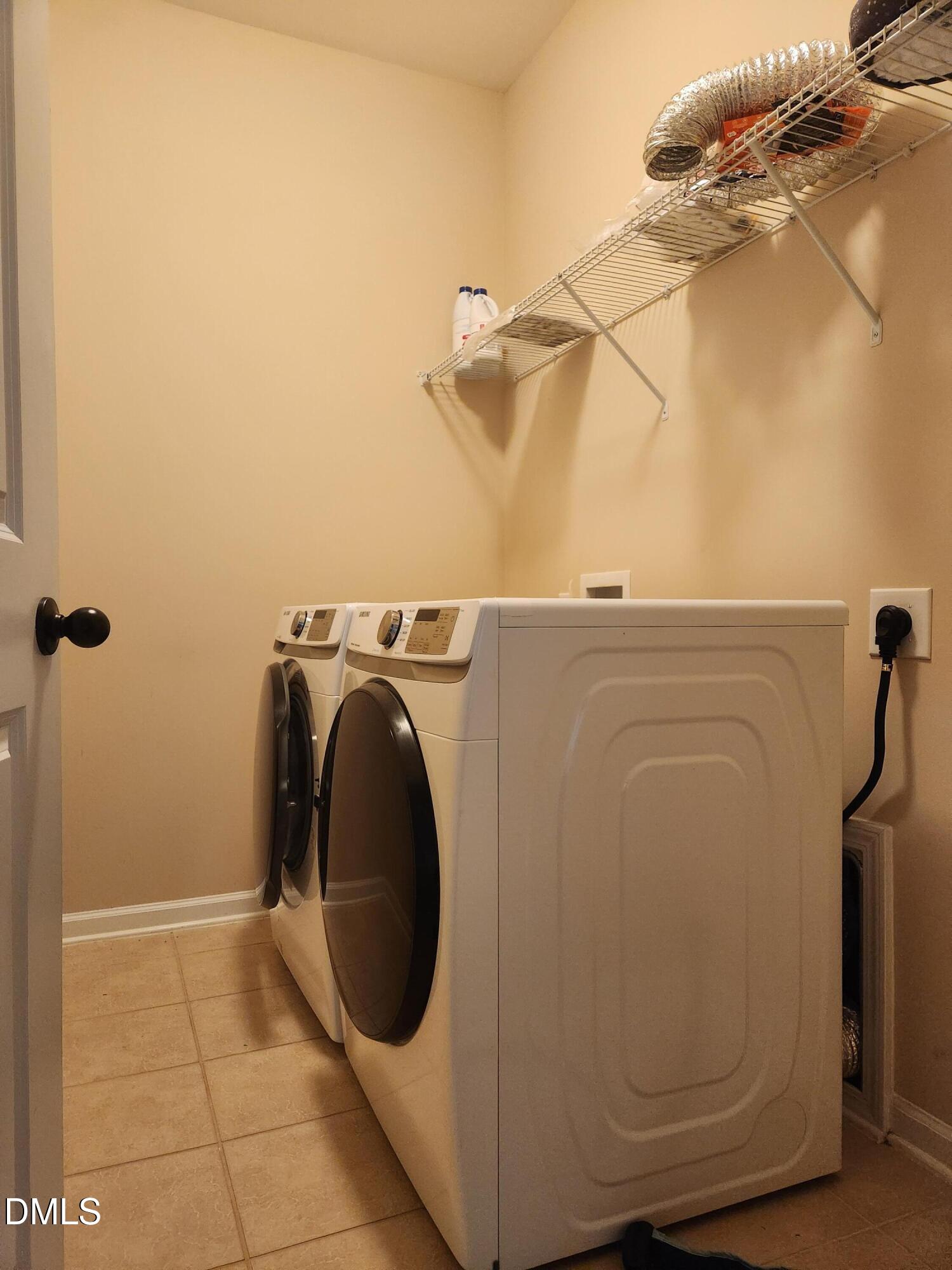 825 Wickham Ridge Road Apex, NC 27539 - Photo 30 of 31 39_Second_Floor_Laundry_1