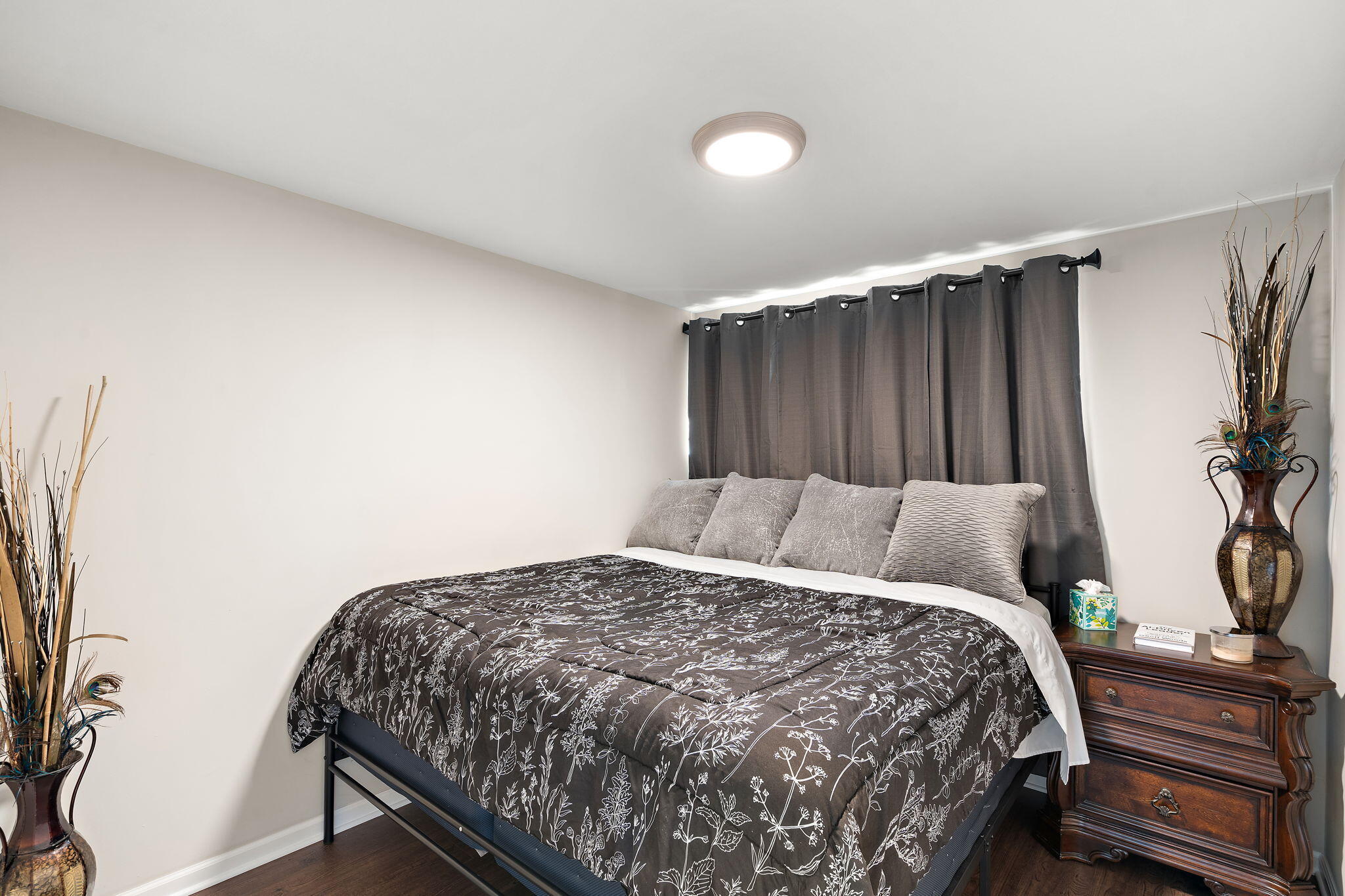 7324 Walnut Avenue Hammond, IN 46324 - Photo 11 of 19 a bedroom with a bed and a table