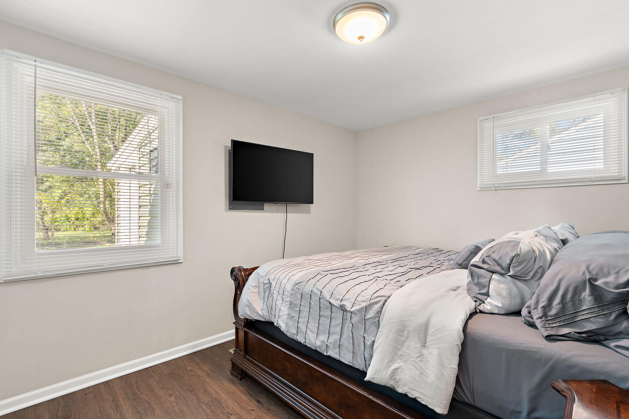 7324 Walnut Avenue Hammond, IN 46324 - Photo 12 of 19 a bedroom with a bed and a flat screen tv