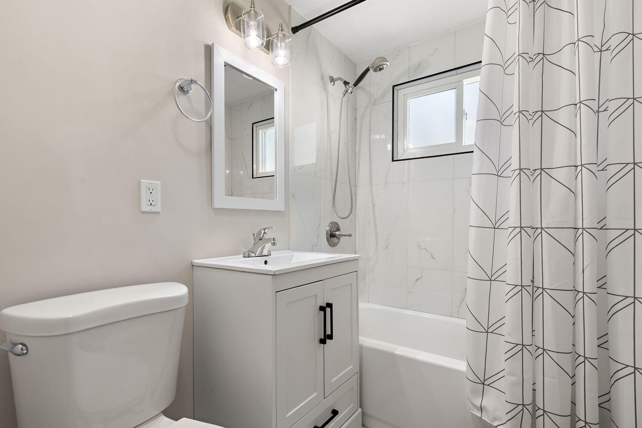 7324 Walnut Avenue Hammond, IN 46324 - Photo 9 of 19 a bathroom with a sink a toilet and shower