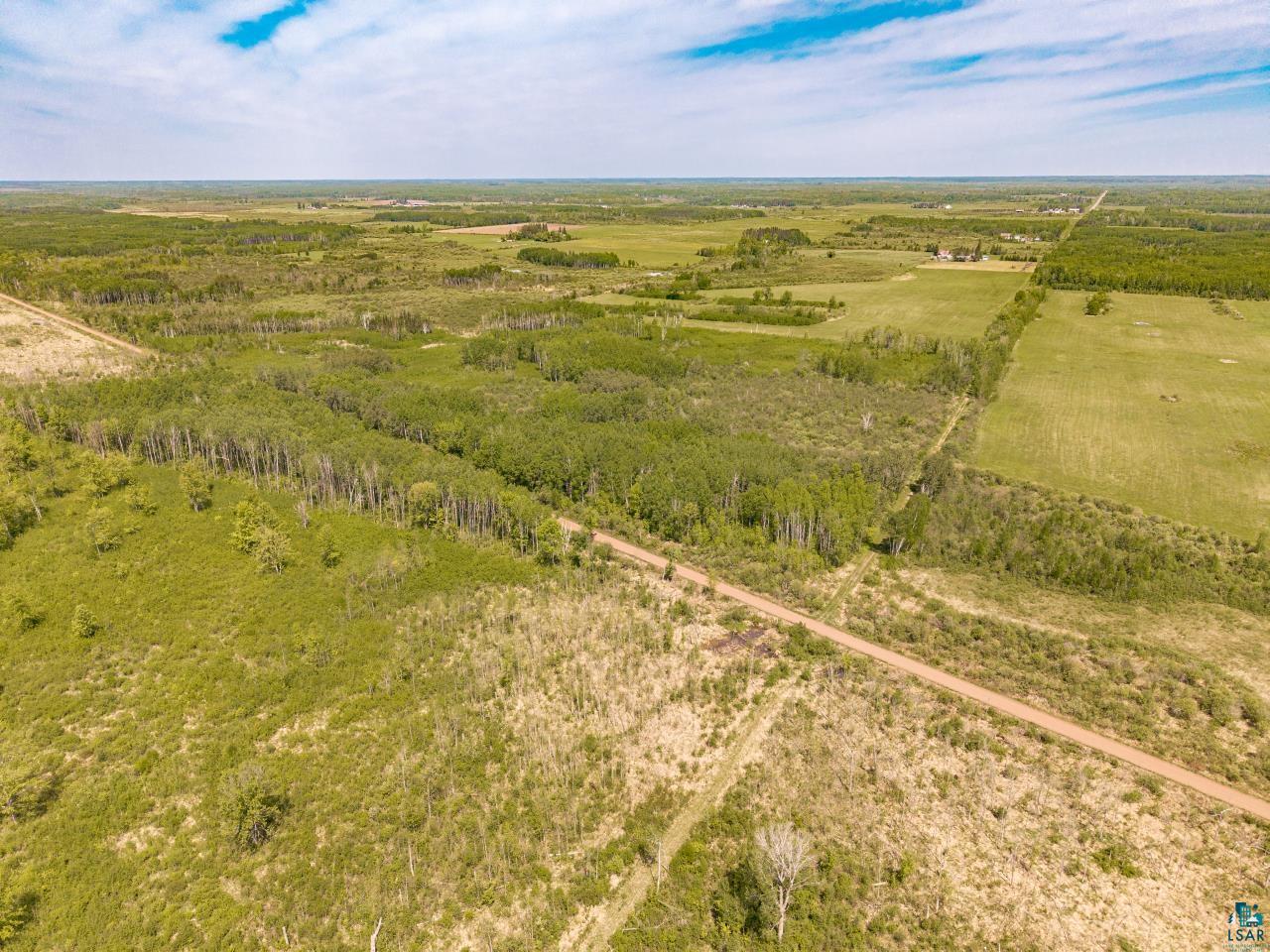 6606 Metso Road Kettle River, MN 55757 - Photo 47 of 84 Expansive land parcel featuring diverse topography with wooded areas and open fields