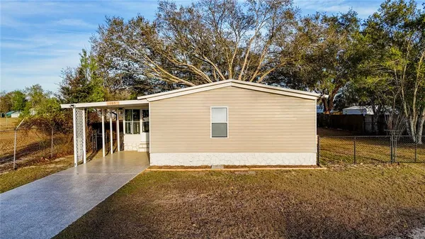 a house with trees in front of it