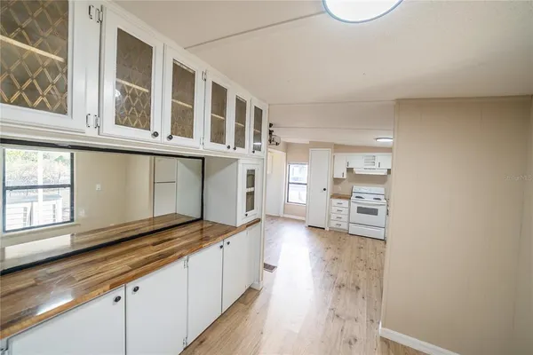a view of a bathroom from a hallway