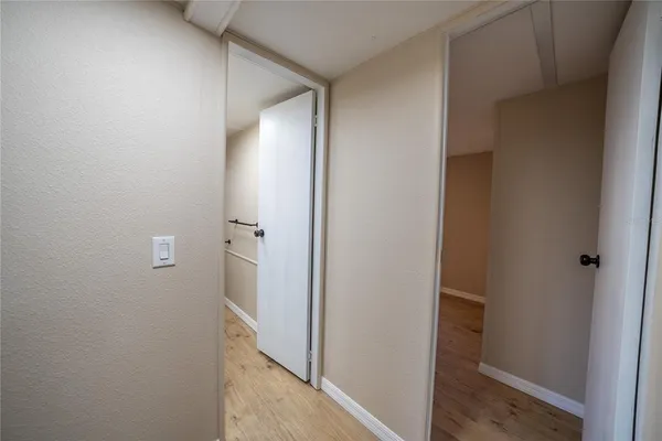 a view of a balcony with wooden floor