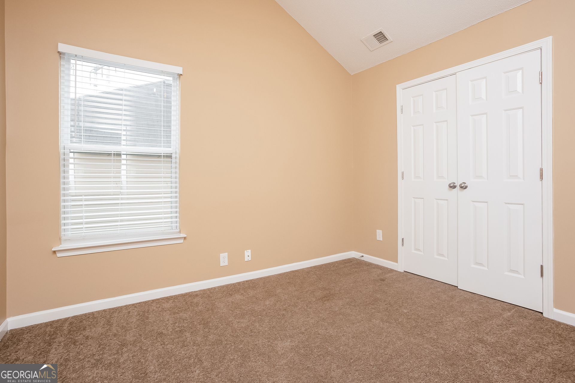 8311 Champion Trail Fairburn, GA 30213 - Photo 11 of 17 a view of an empty room with a window