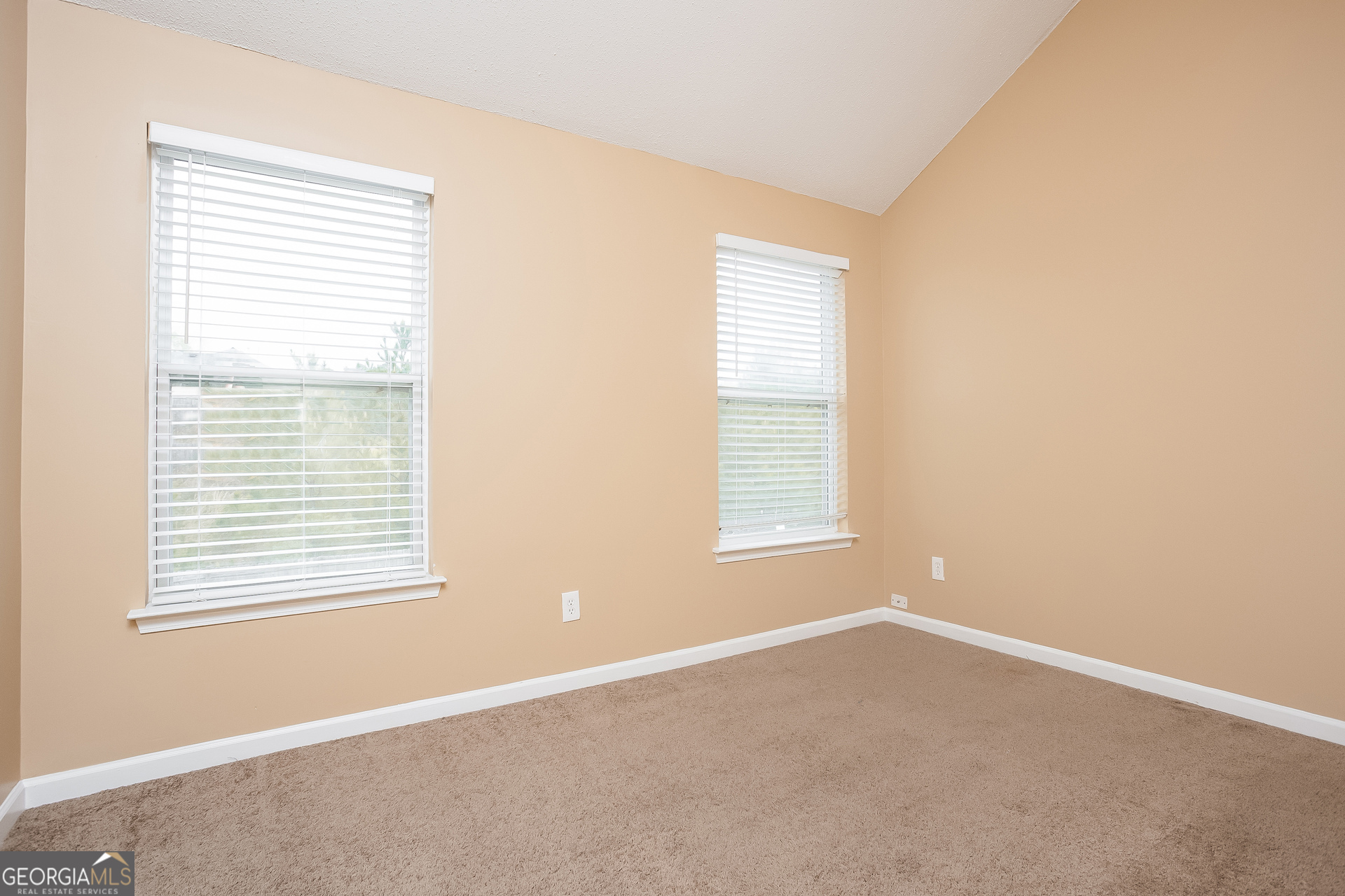 8311 Champion Trail Fairburn, GA 30213 - Photo 12 of 17 an empty room with a window