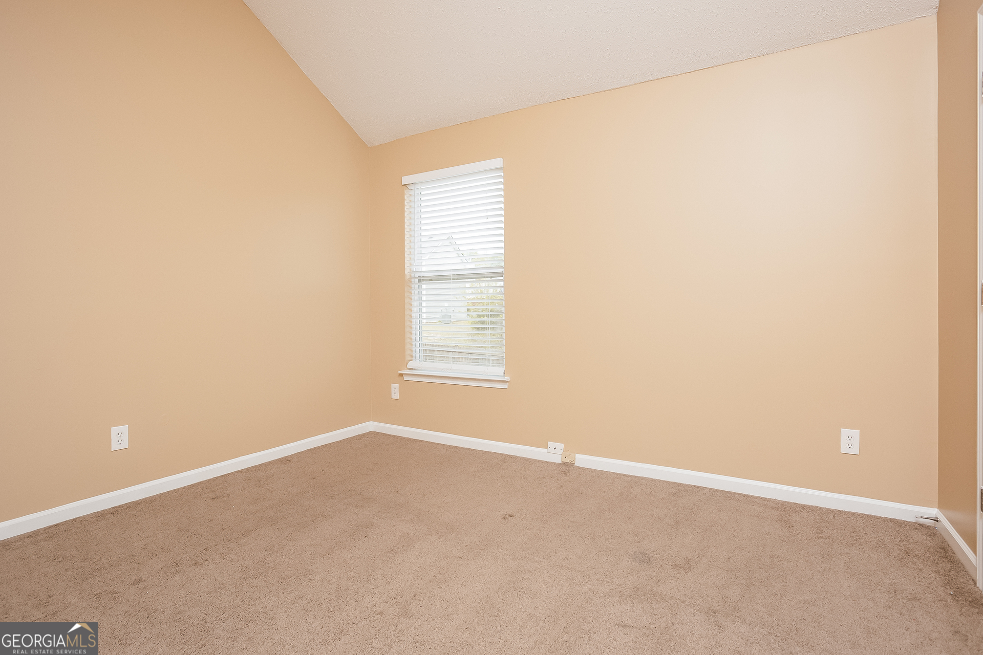 8311 Champion Trail Fairburn, GA 30213 - Photo 7 of 17 an empty room with windows