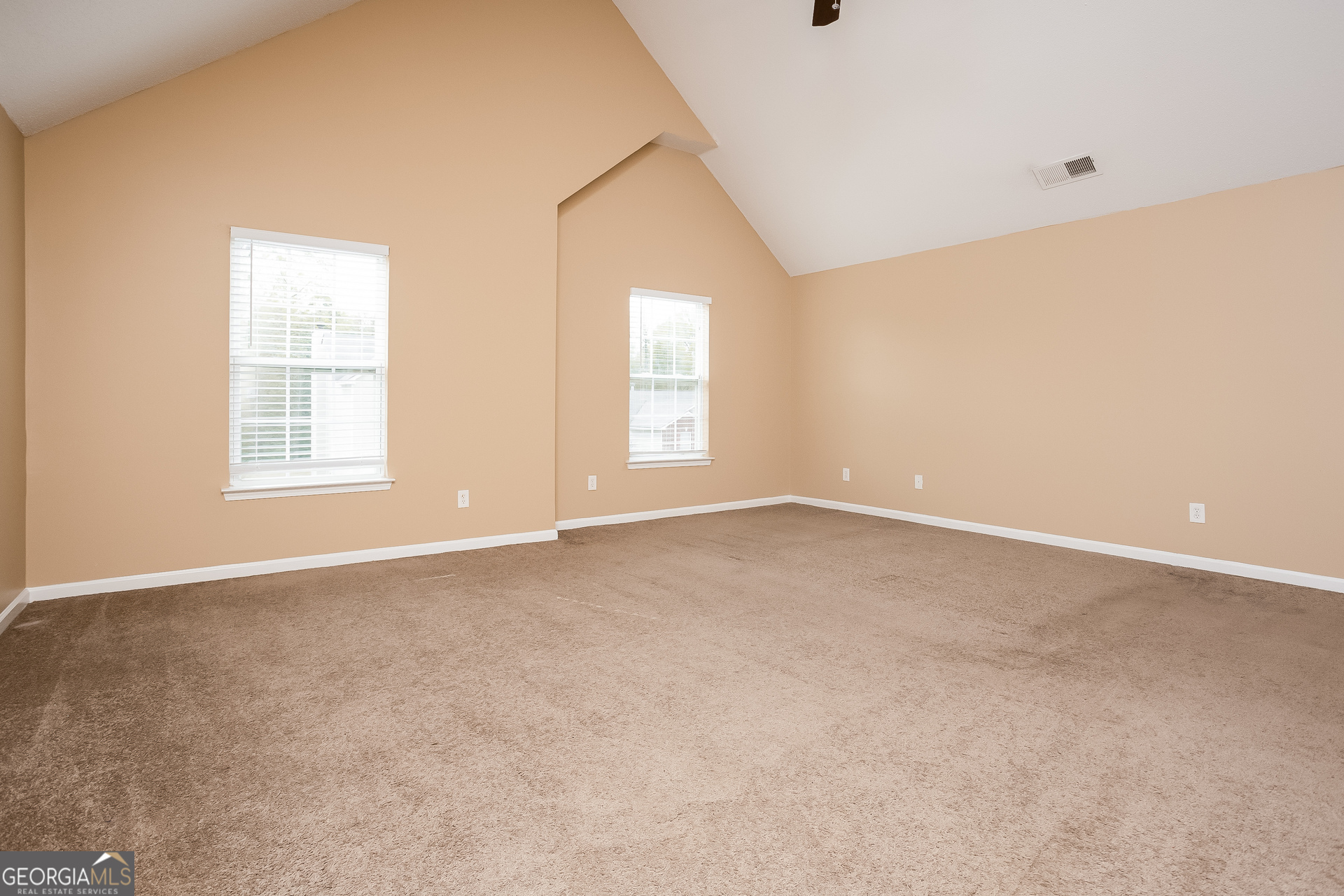 8311 Champion Trail Fairburn, GA 30213 - Photo 8 of 17 an empty room with windows