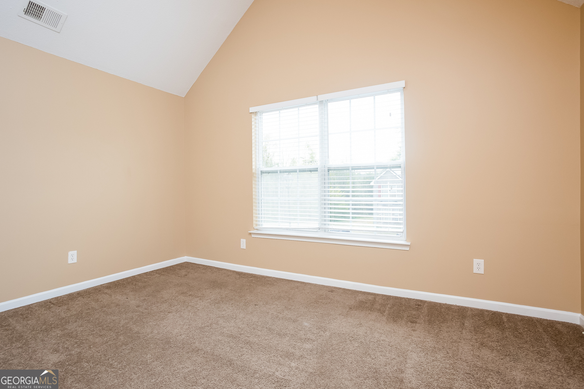 8311 Champion Trail Fairburn, GA 30213 - Photo 10 of 17 an empty room with a window