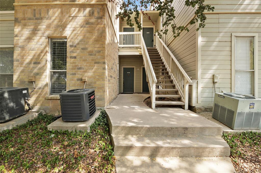 2450 Wickersham Lane, Unit 106 Austin, TX 78741 - Photo 12 of 13 a view of stairs and workspace