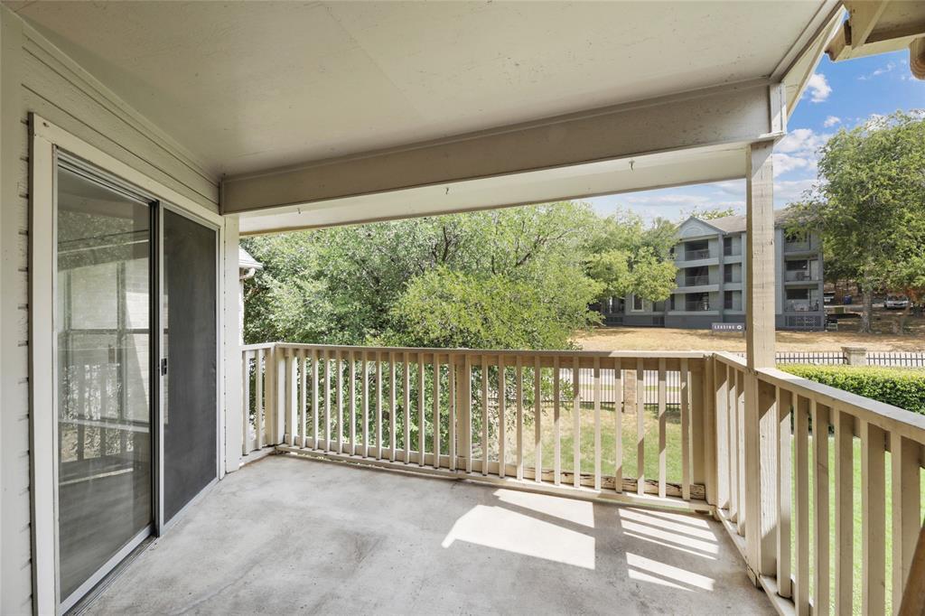 2450 Wickersham Lane, Unit 106 Austin, TX 78741 - Photo 9 of 13 a view of a balcony with outdoor space
