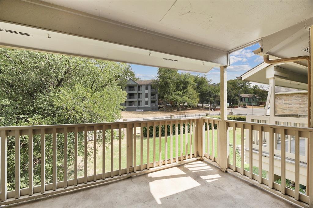 2450 Wickersham Lane, Unit 106 Austin, TX 78741 - Photo 10 of 13 a view of a balcony