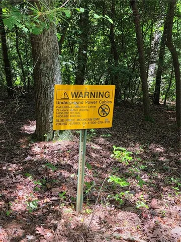 a sign that is on the side of the road