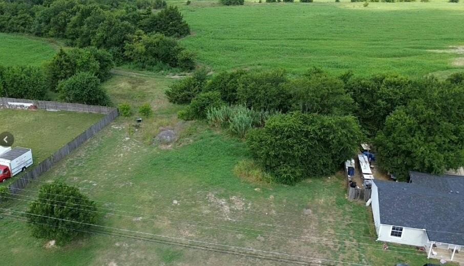 224 Overlook Drive Red Oak, TX 75154 - Photo 5 of 11 a backyard of a house with lots of green space and trees