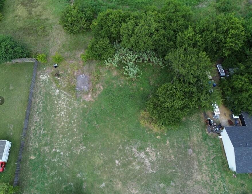 224 Overlook Drive Red Oak, TX 75154 - Photo 6 of 11 a backyard of a house with lots of green space and lake view