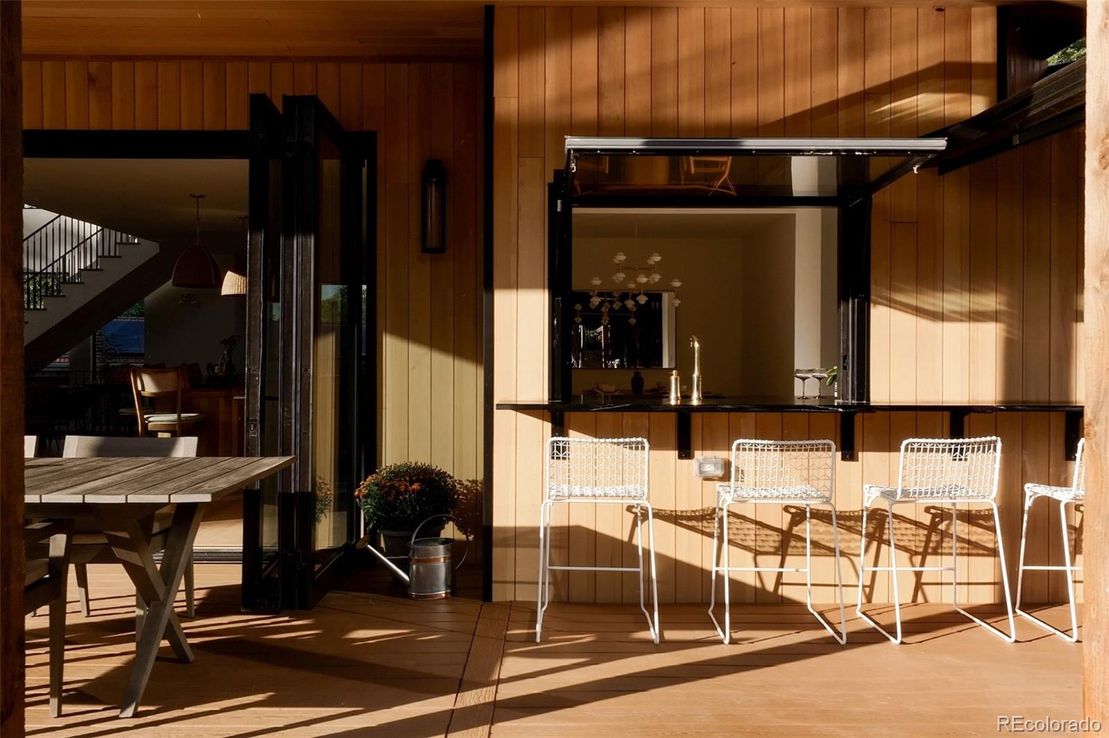 2745 Deframe Road Golden, CO 80401 - Photo 21 of 50 a view of a dining room with furniture