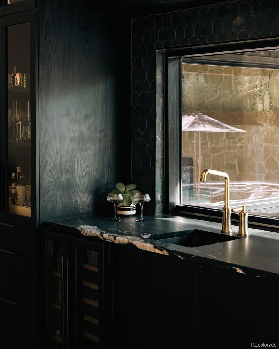 2745 Deframe Road Golden, CO 80401 - Photo 22 of 50 a living room with table