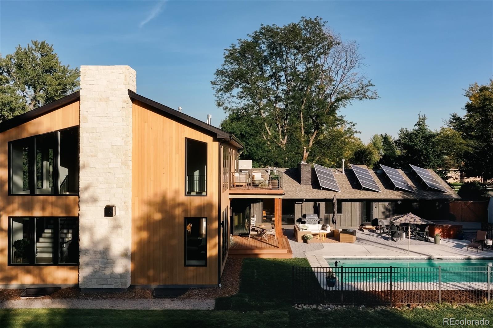2745 Deframe Road Golden, CO 80401 - Photo 32 of 50 a front view of a house with garden
