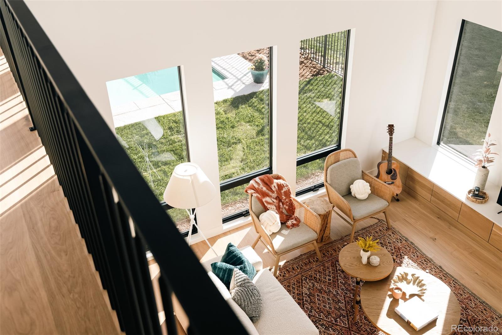 2745 Deframe Road Golden, CO 80401 - Photo 33 of 50 a living room with furniture and a large window