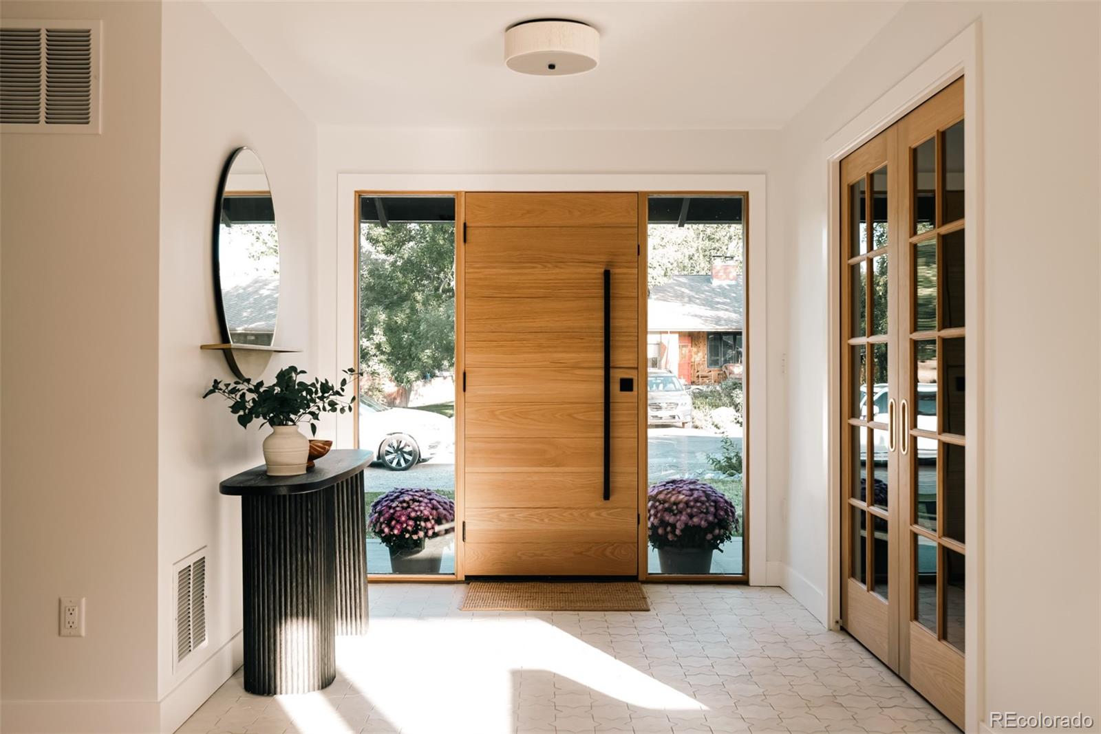 2745 Deframe Road Golden, CO 80401 - Photo 4 of 50 a view of entryway with livingroom