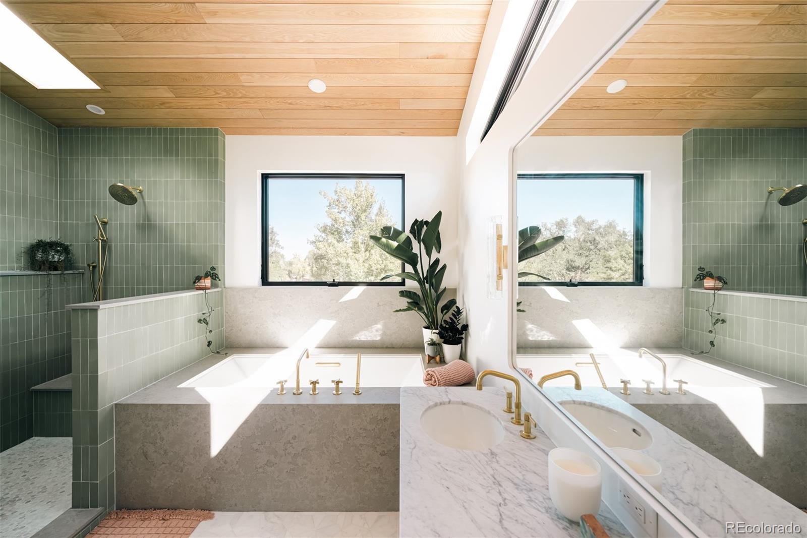2745 Deframe Road Golden, CO 80401 - Photo 41 of 50 a living room with furniture and a large window