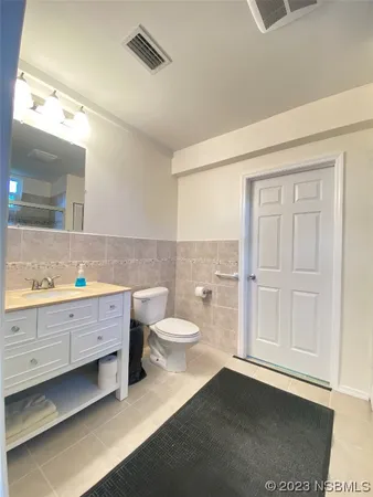a view of a hallway with a room