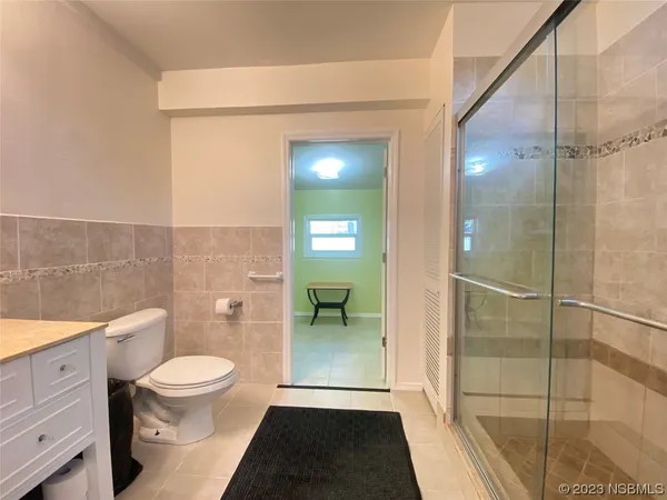 a view of storage and utility room with washer and dryer