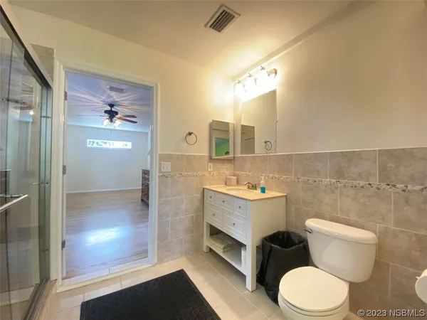 a view of workspace with furniture and window