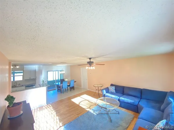 a living room with furniture and a table