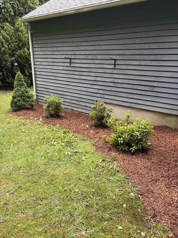 16 Clark Street Belchertown, MA 01007 - Photo 4 of 23 a front view of a house with a yard