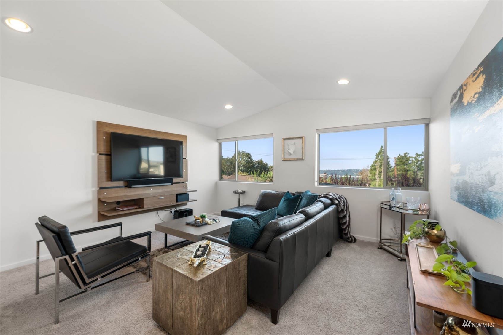 1413 South 28th Street Renton, WA 98055 - Photo 17 of 20 a living room with furniture and a flat screen tv