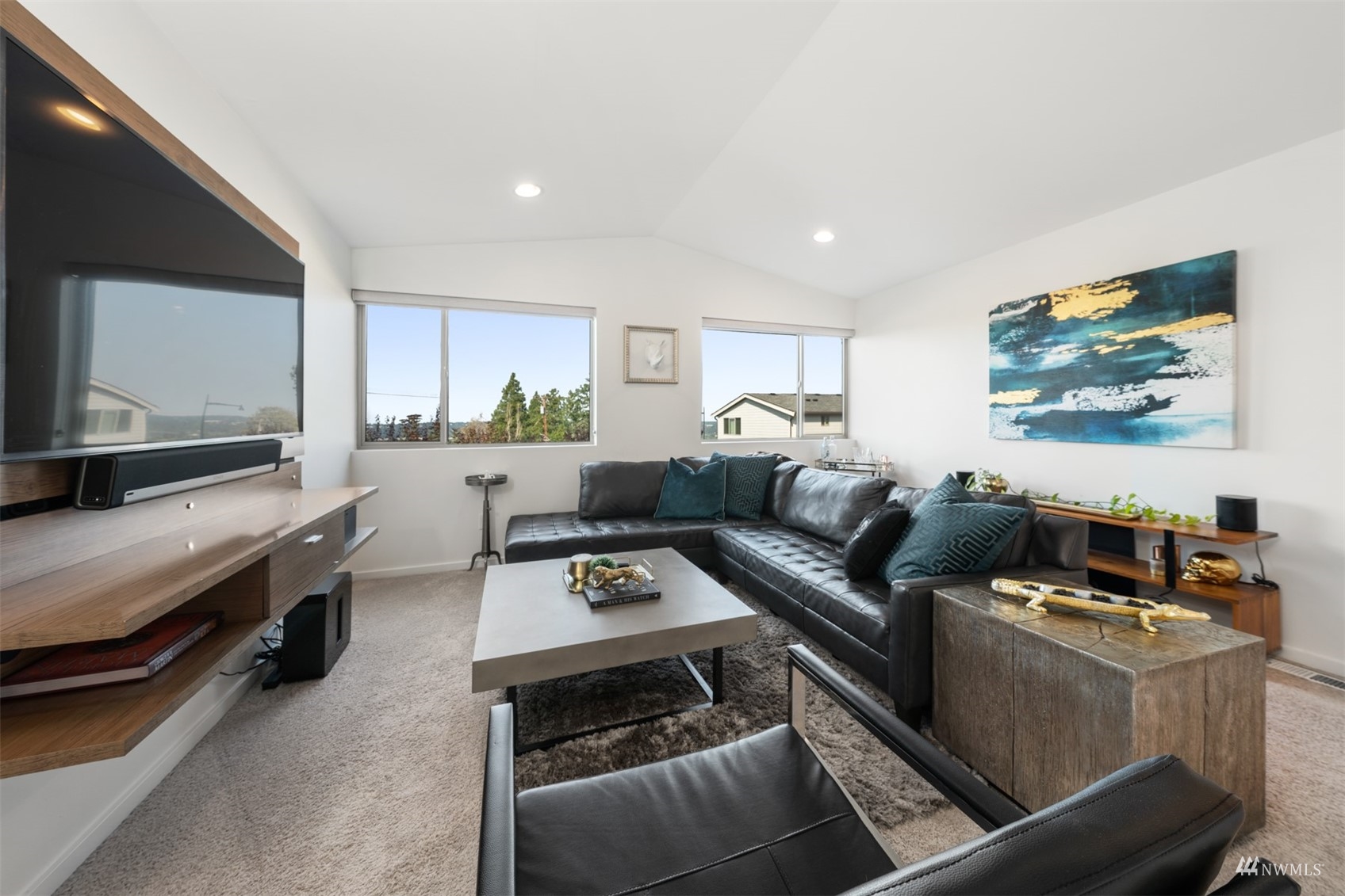 1413 South 28th Street Renton, WA 98055 - Photo 18 of 20 a living room with furniture and a flat screen tv